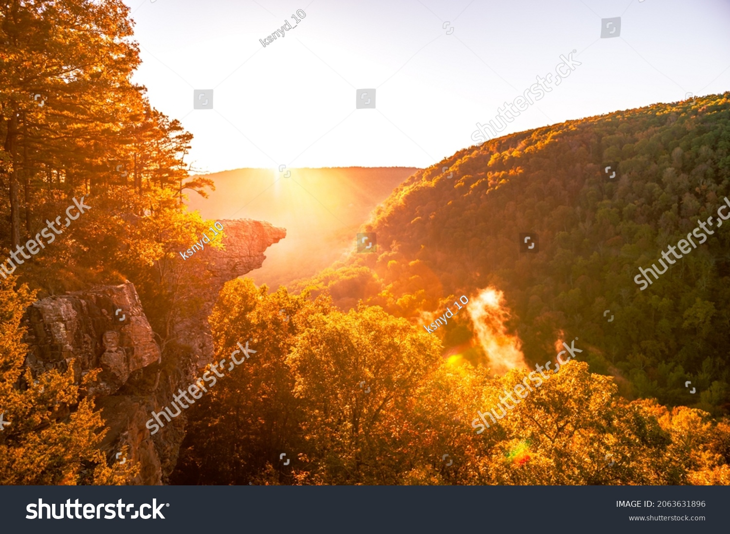 Sunrise at Whitaker Point, known as Hawksbill Crag, during the fall color change of the leaves. Hawksbill is a popular tourist site in the state of Arkansas. #2063631896