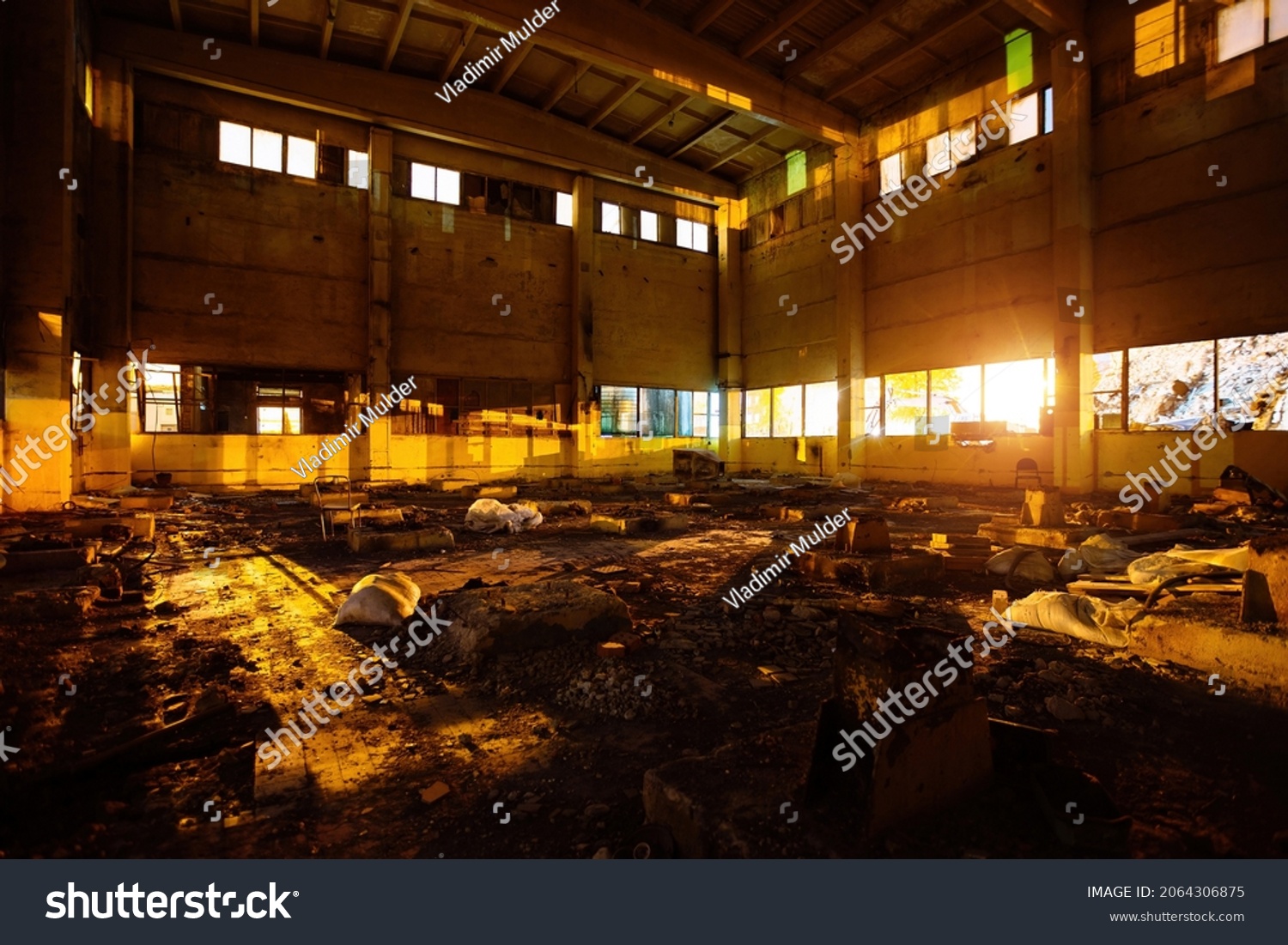 Dark creepy empty abandoned industrial building interior at night. #2064306875