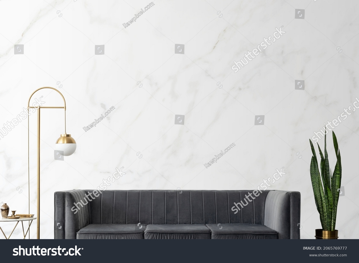 Chic mid-century modern luxury aesthetics living room with gray velvet couch and golden lamp #2065769777