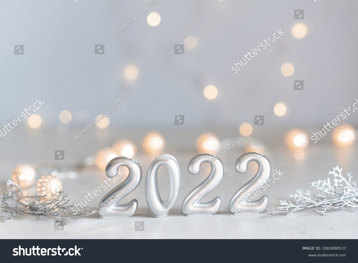 happy new year 2022 background new year holidays card with bright lights,gifts and bottle of hampagne #2065890533