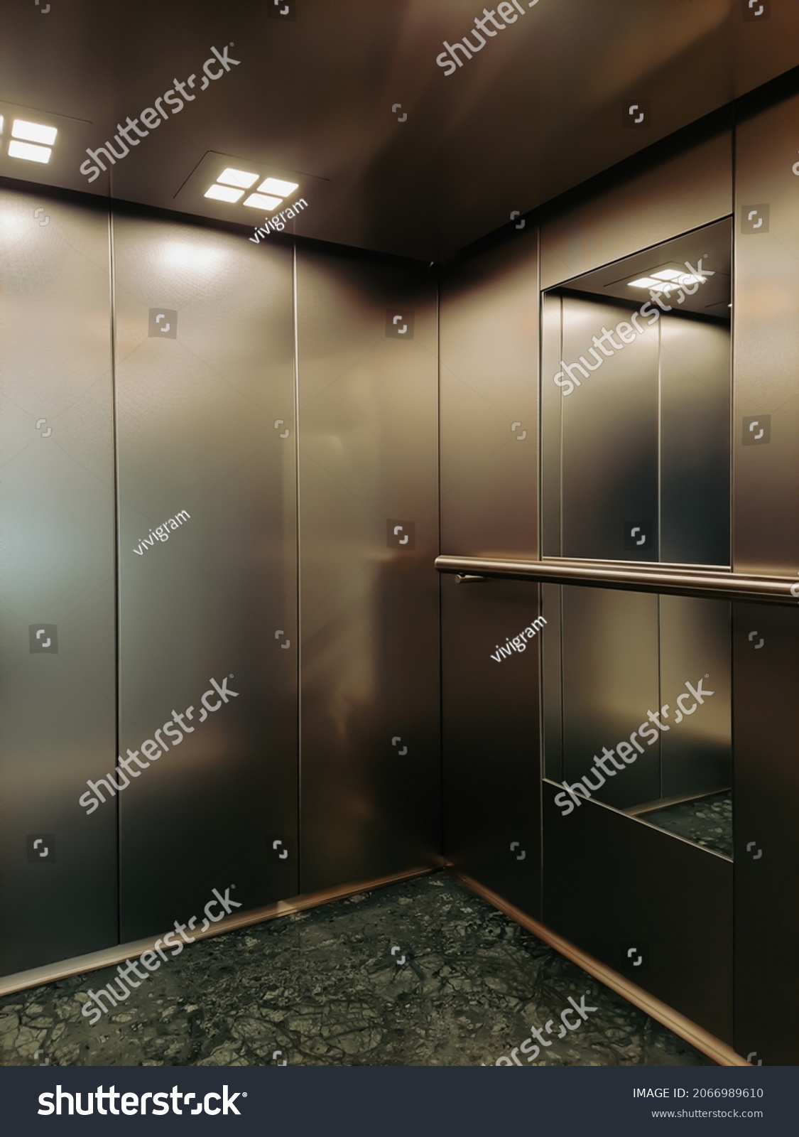 Inside an elevator lift cabin. Look inside an elevator car. #2066989610