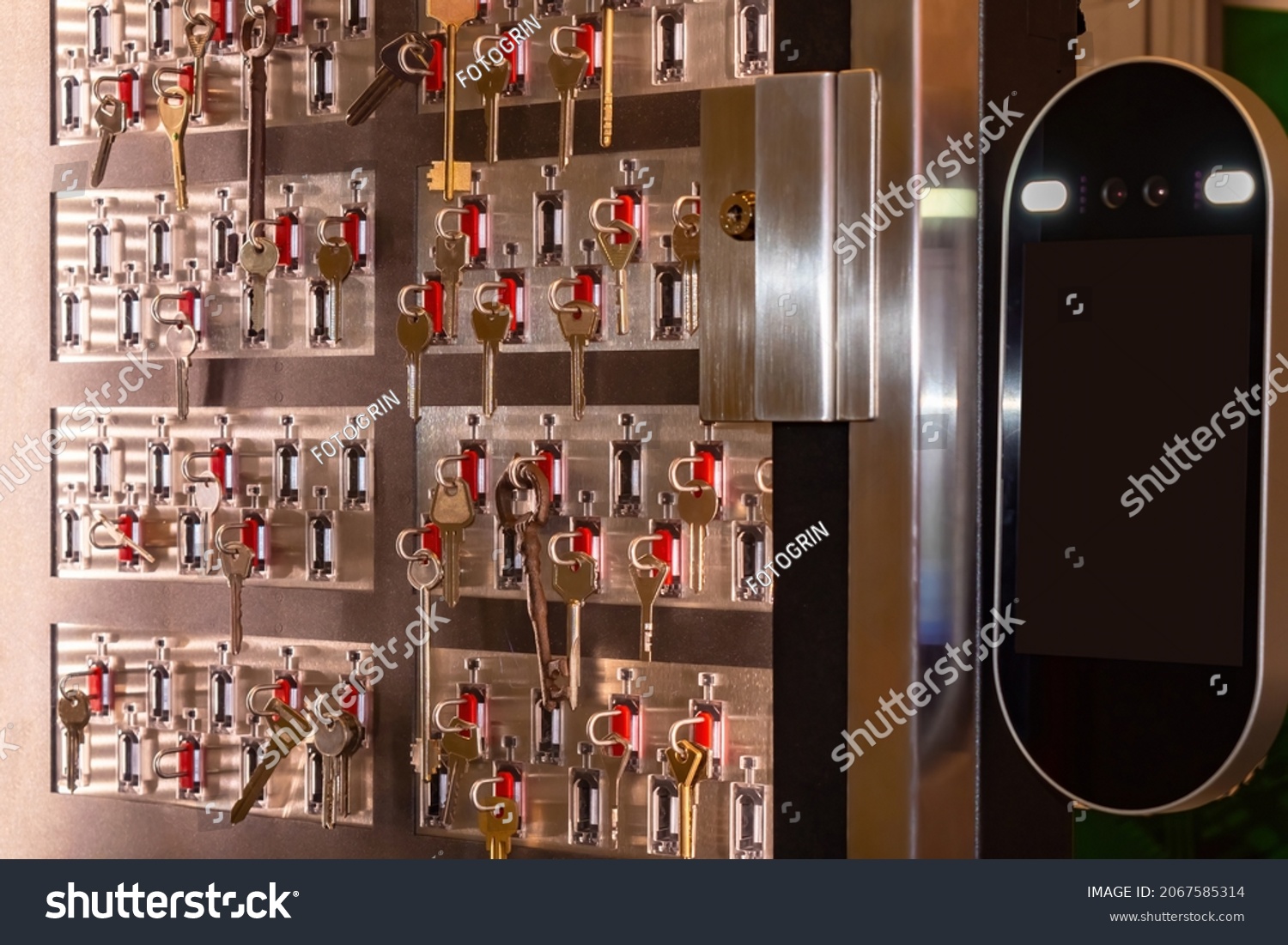 Intelligent key storage systems. Key storage and distribution system. Metal clef cabinet with a transparent window. Equipment for issuing key on a magnetic card. Security and access control systems #2067585314