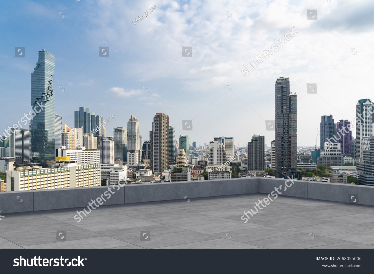 Panoramic Bangkok skyline view, concrete observatory deck on rooftop, daytime. Luxury Asian corporate and residential lifestyle. Financial city downtown, real estate. Product display mockup empty roof #2068055006
