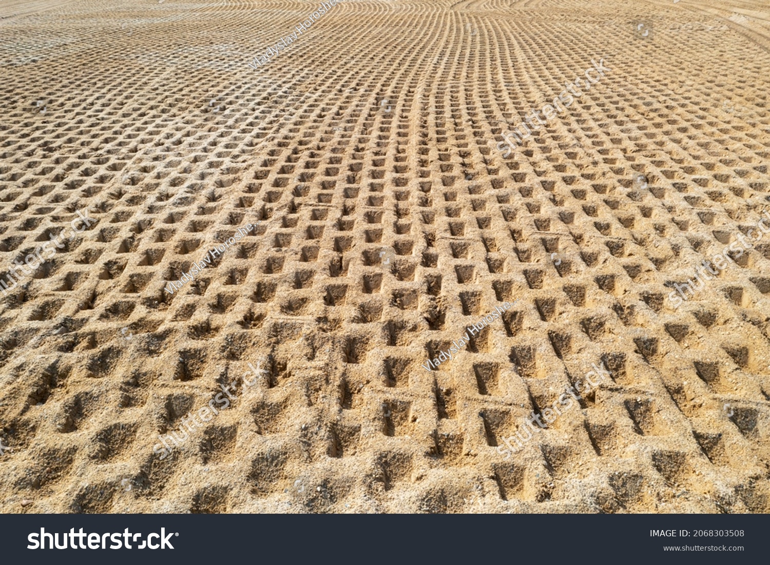 Compaction of soil at the construction site, compaction of soil before construction #2068303508