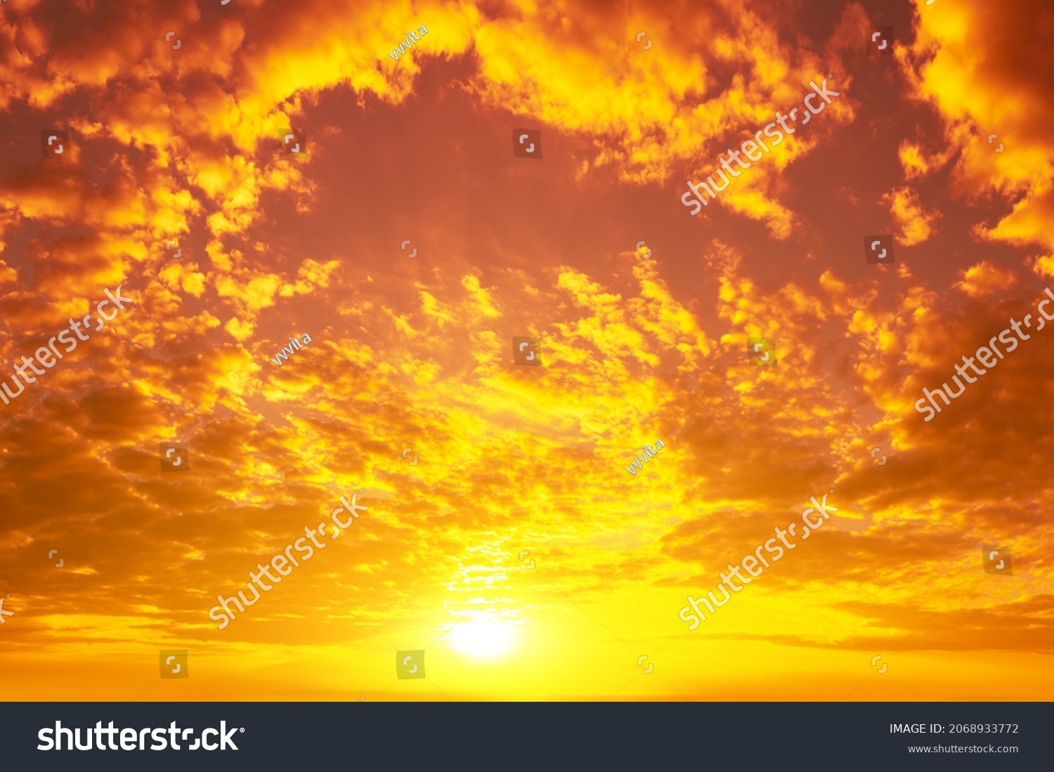 Blazing cloudy sky at sunset. Sky texture, abstract nature background #2068933772