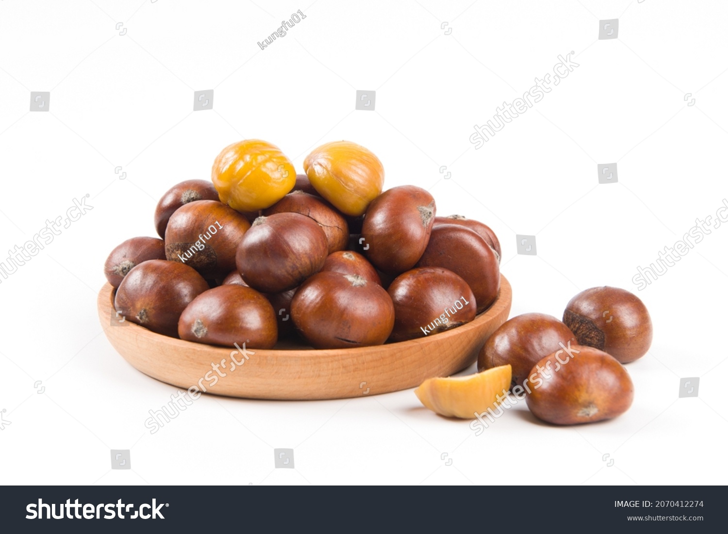 Close-up Chestnuts with peeled  isolated on white background. #2070412274