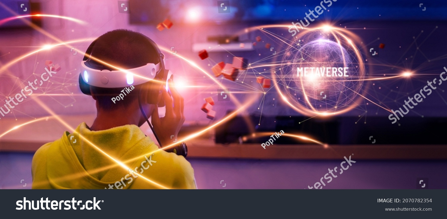 Metaverse Technology concepts. Teenager play VR virtual reality goggle and experiences of metaverse virtual world on colorful. Visualization and simulation, 3D, AR, VR, Innovation of futuristic. #2070782354