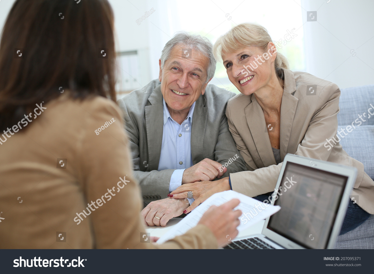 Senior couple meeting real estate agent #207095371