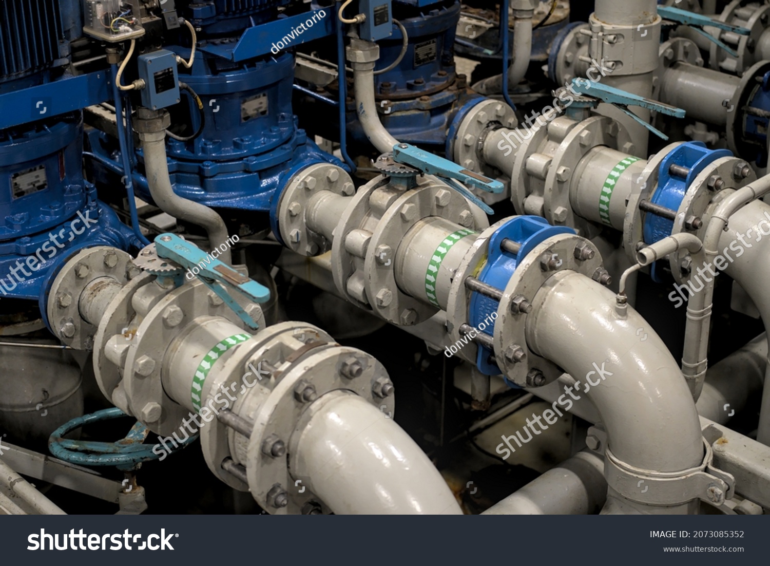 Industrial valves, pipes in modern offshore ship's engine room #2073085352