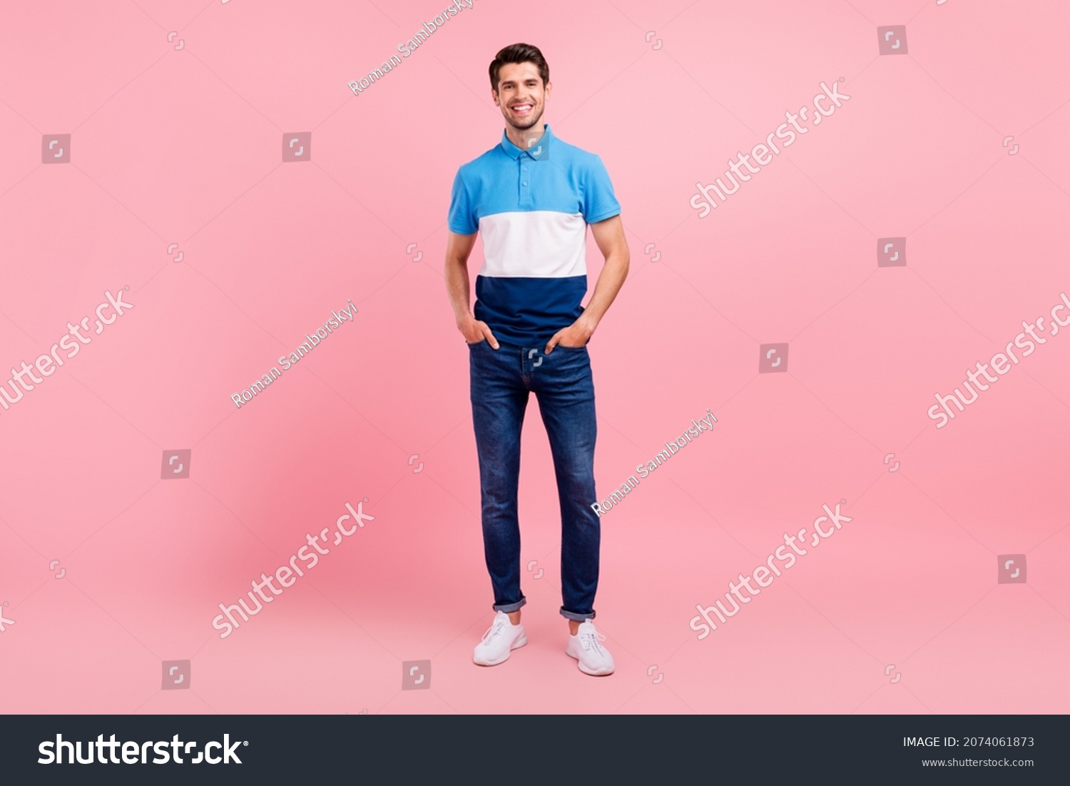 Full length photo of cool brunet young guy stand wear polo jeans sneakers isolated on pink background #2074061873