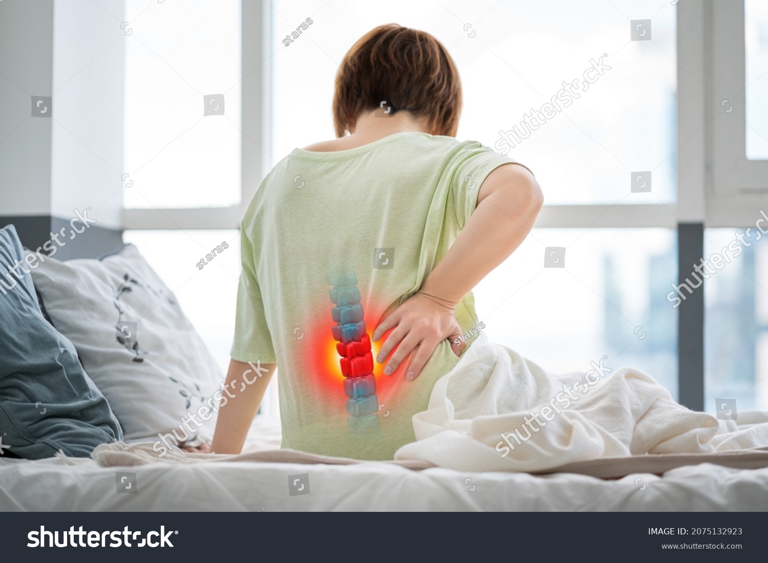 Lumbar intervertebral spine hernia, woman with back pain at home, spinal disc disease, health problems concept #2075132923