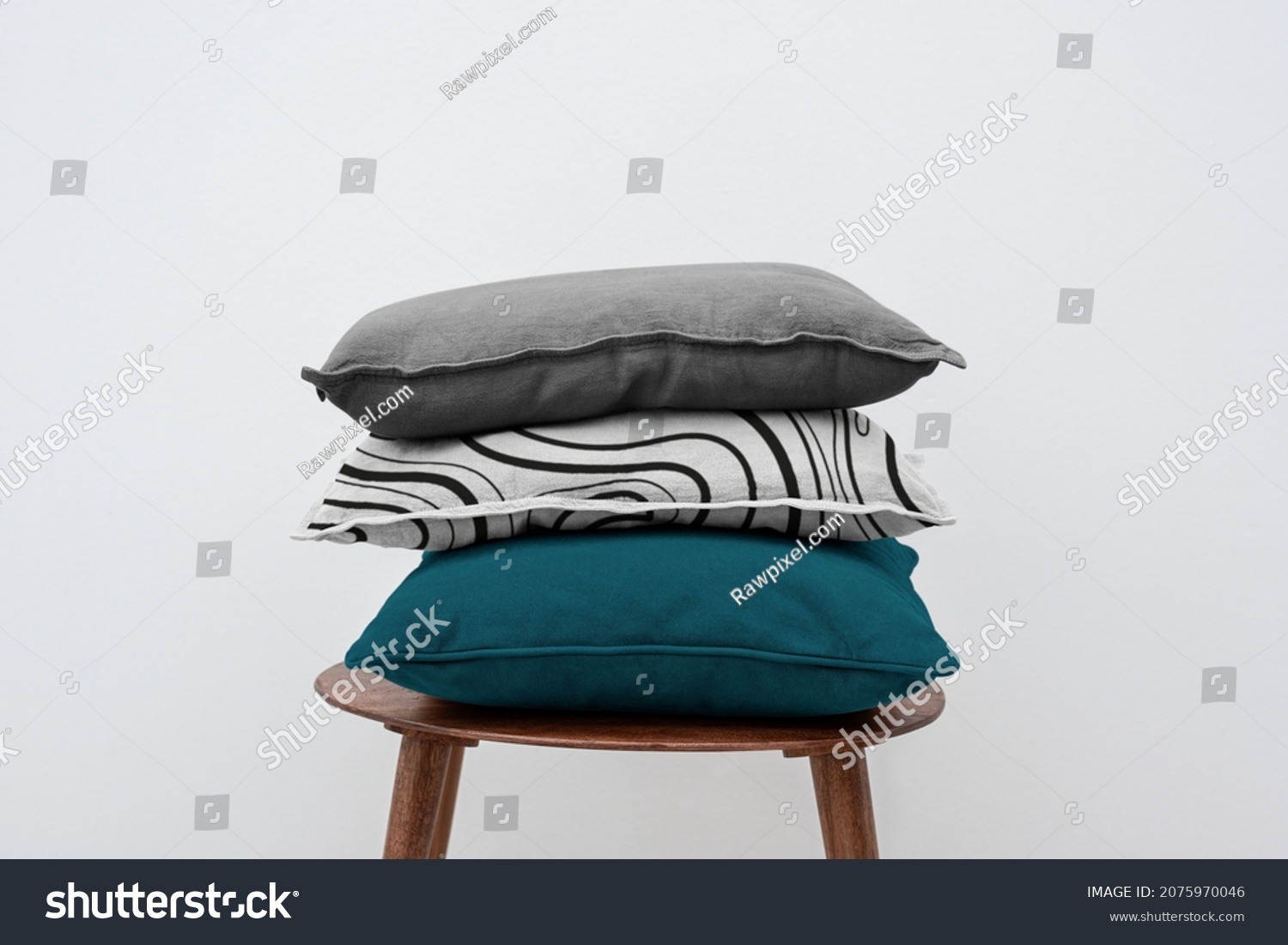 Minimal linen cushion covers on a chair #2075970046