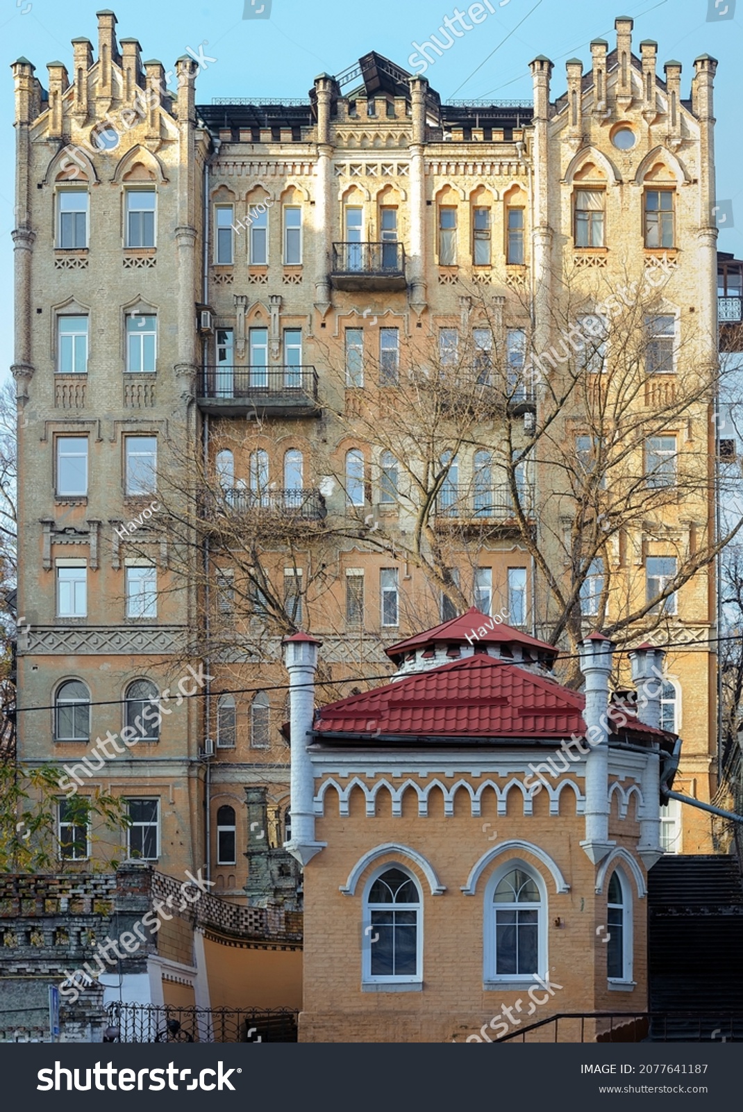 Small outbuilding in front of big old building in Kyiv Ukraine #2077641187