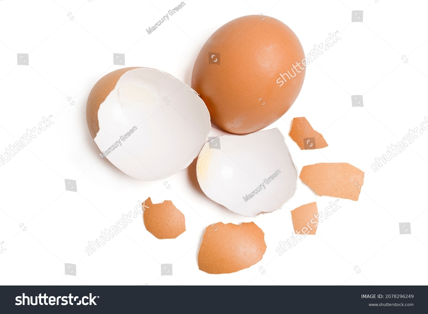 Isolated Broken eggshell. Top view group of broken eggshells stacked on white background. Flat lay. #2078296249