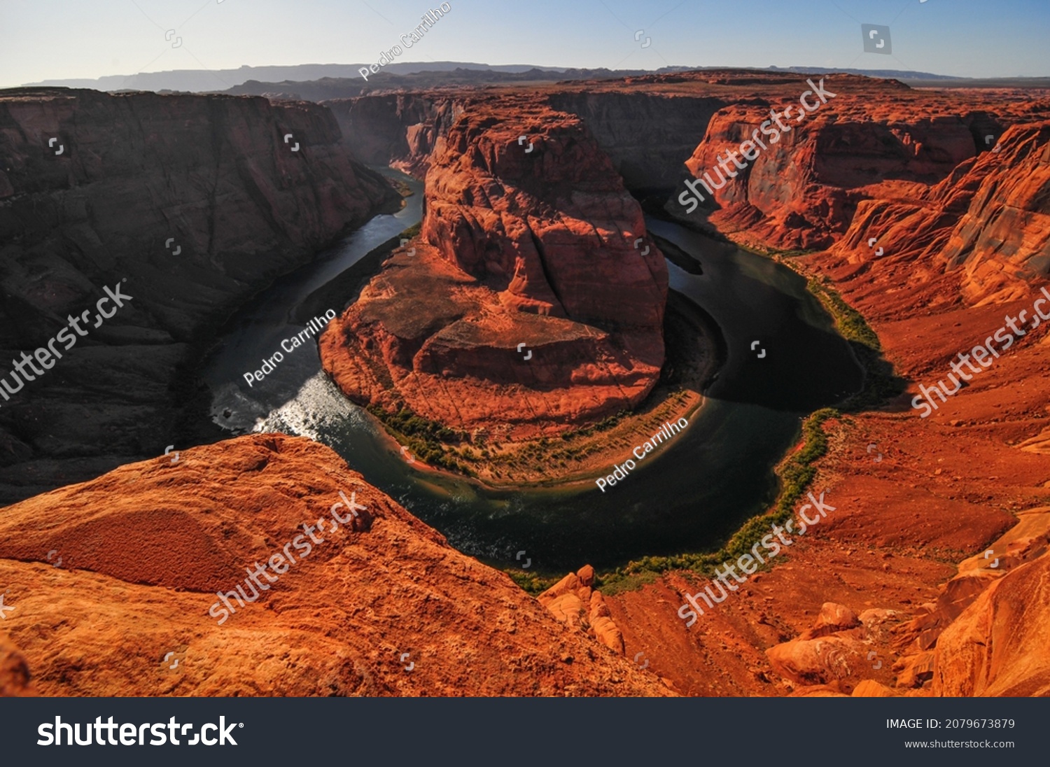 Harsh afternoon light at the popular Horseshoe Bend of the Colorado river, Glen Canyon National Recreation Area, Page, Arizona, Southwest USA #2079673879