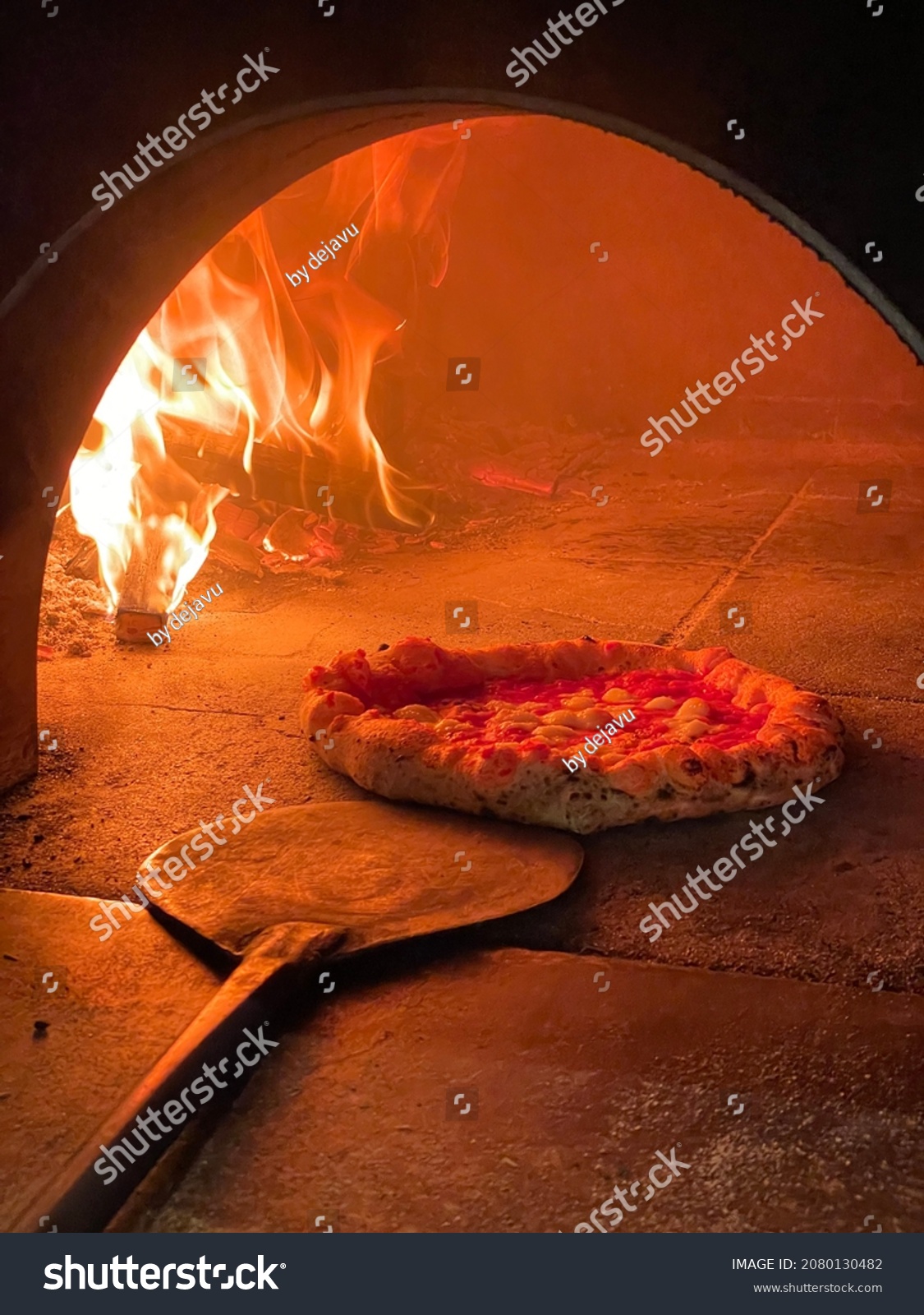 wood-fired pizza, classic Italian recipe #2080130482