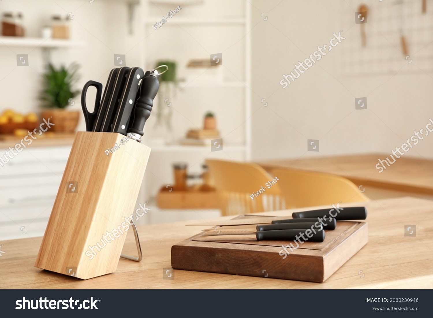 Set of knives on table in kitchen #2080230946