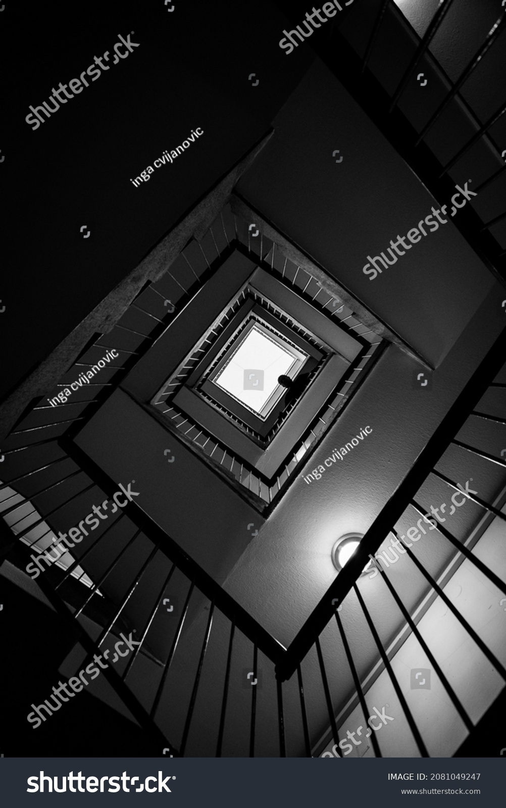 Infinite dark black and white stairs going up and up. #2081049247