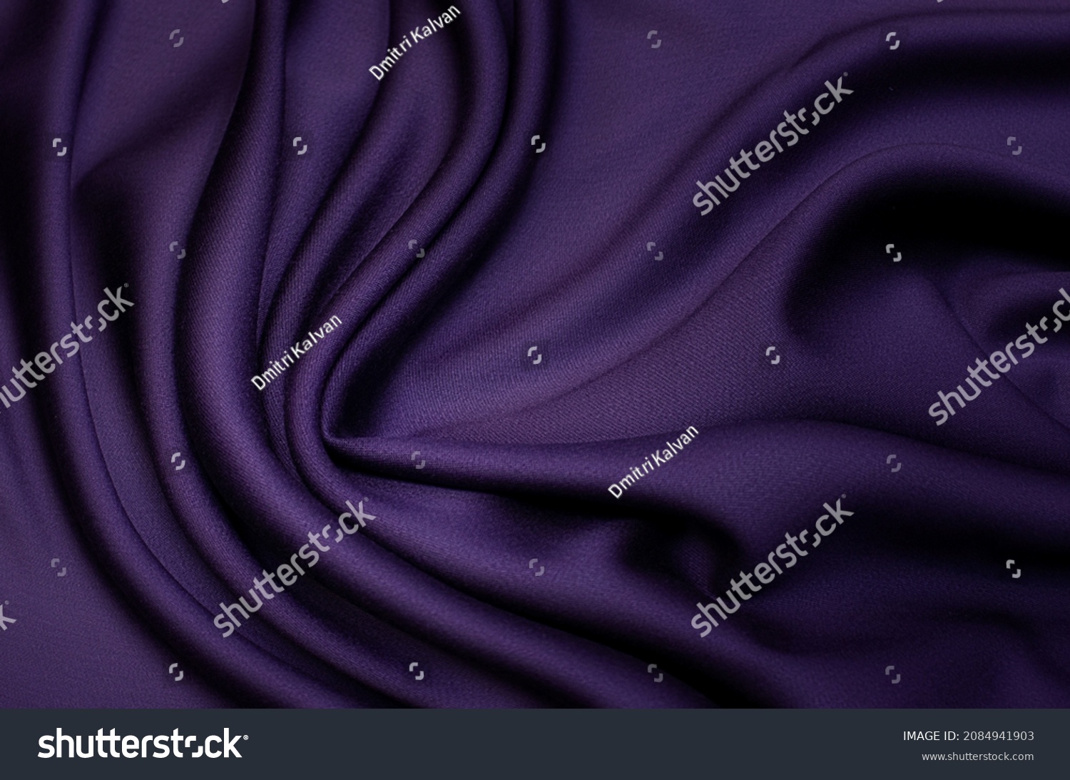 Abstract background texture of natural violet, purple or lilac color fabric. Fabric texture of natural cotton or linen, silk or satin, wool or jersey textile material. Luxurious modern canvas textile. #2084941903