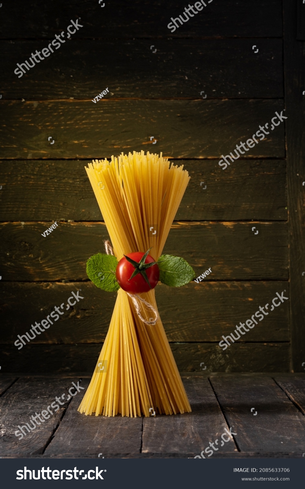 Spaghetti and cherry tomatoes. Not cooked spaghetti. Spaghetti standing upright. #2085633706