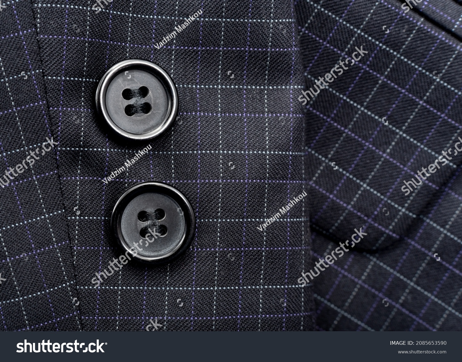 Sleeve with buttons on the men's check suit. Men's suit. Part, item of clothing #2085653590
