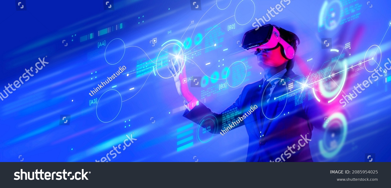 Metaverse digital cyber world technology, man with virtual reality VR goggle playing AR augmented reality game entertainment and business meeting conference, futuristic lifestyle #2085954025