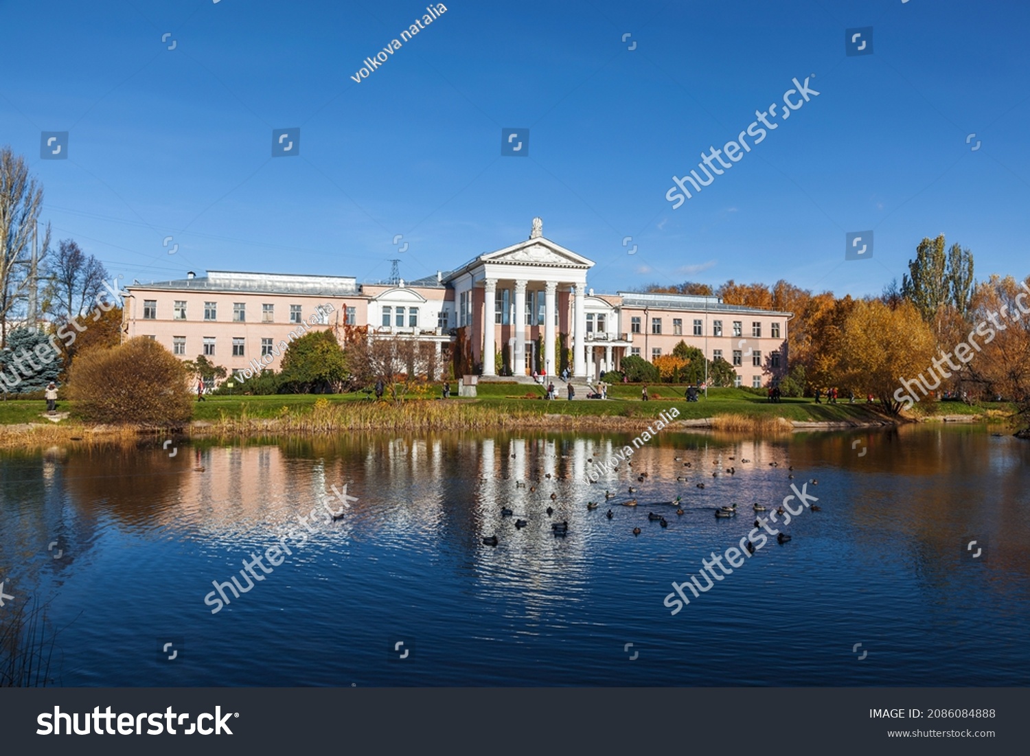 View of the N.V.Tsitsin Main Botanical Garden of the Russian Academy of Sciences, laboratory building (1951) and pond. Moscow, Russia #2086084888