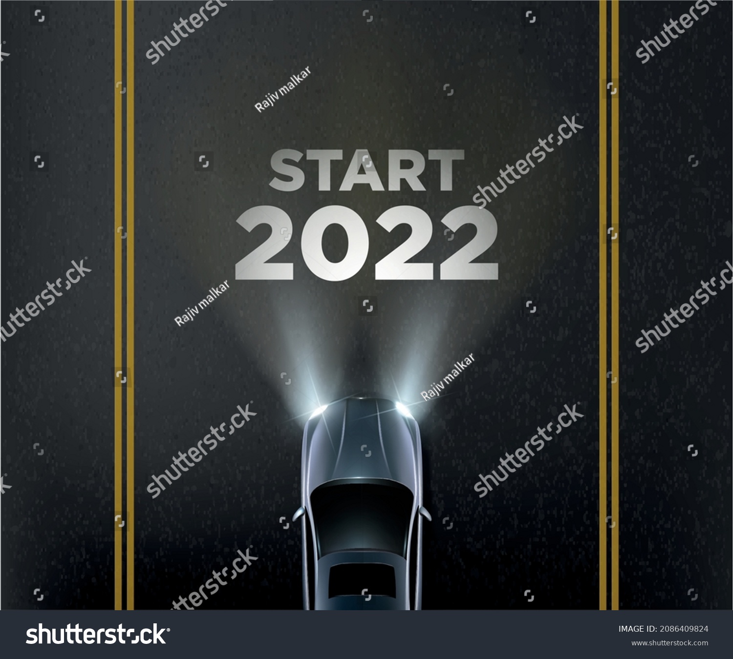 new year 2022 concept with car headlights, 2022 painted on road  #2086409824