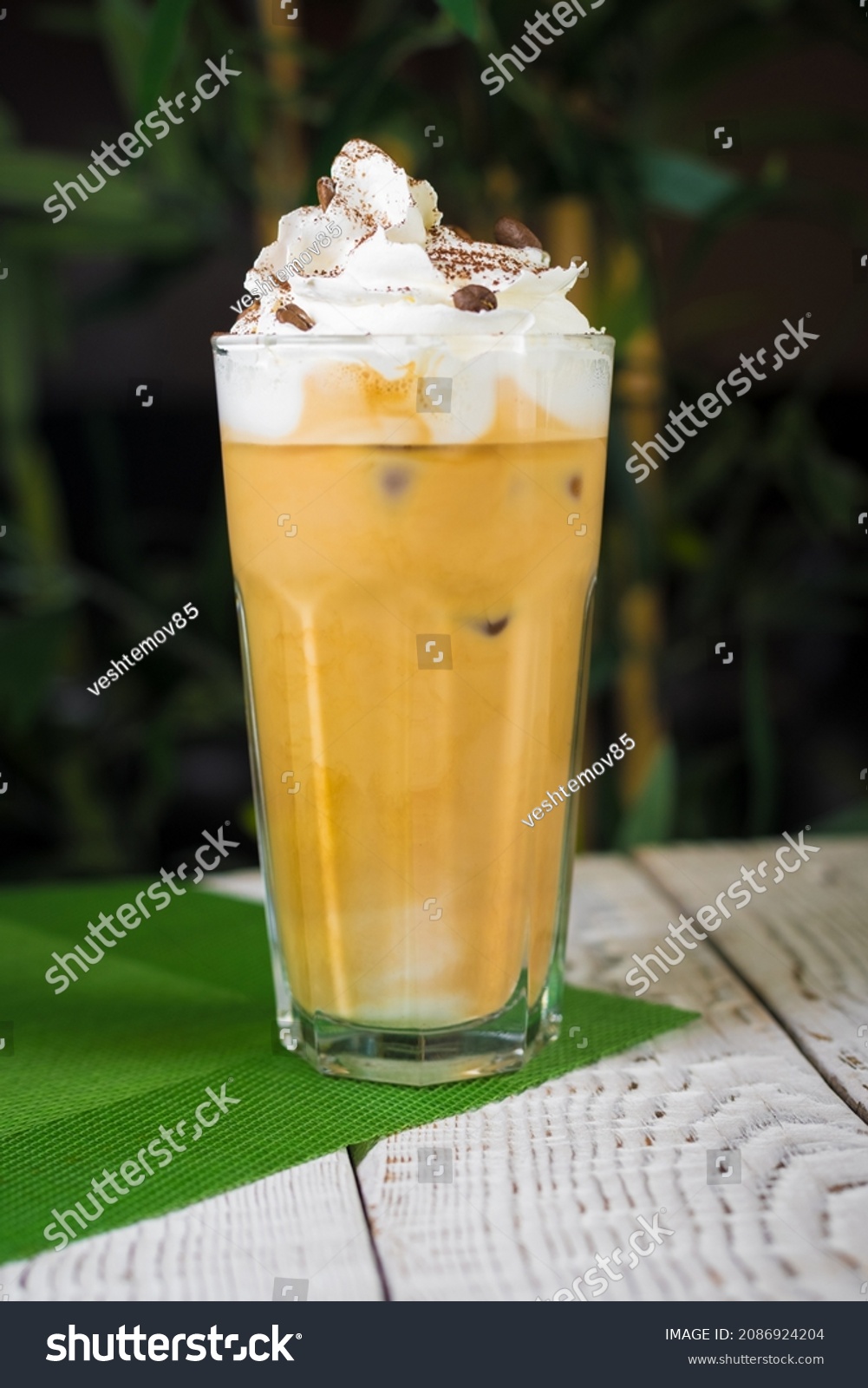 Ice coffee on the glass table, seleced focus #2086924204