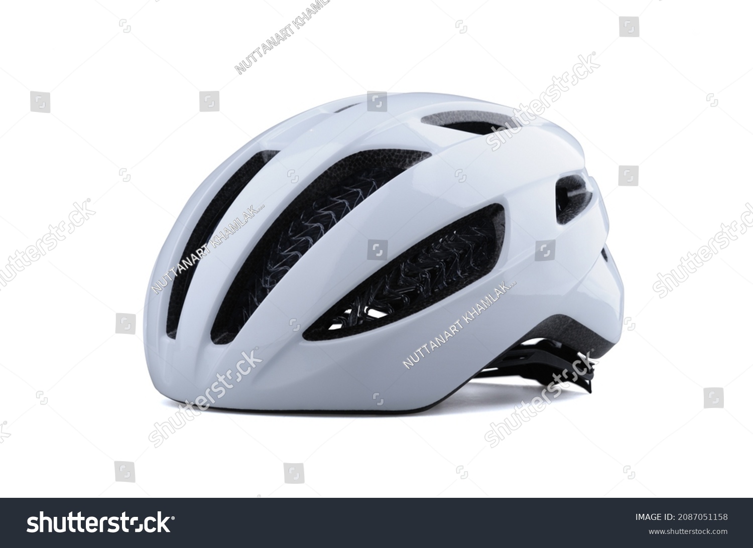 White bicycle helmet isolated on white background. Perspective view of bicycle helmet #2087051158
