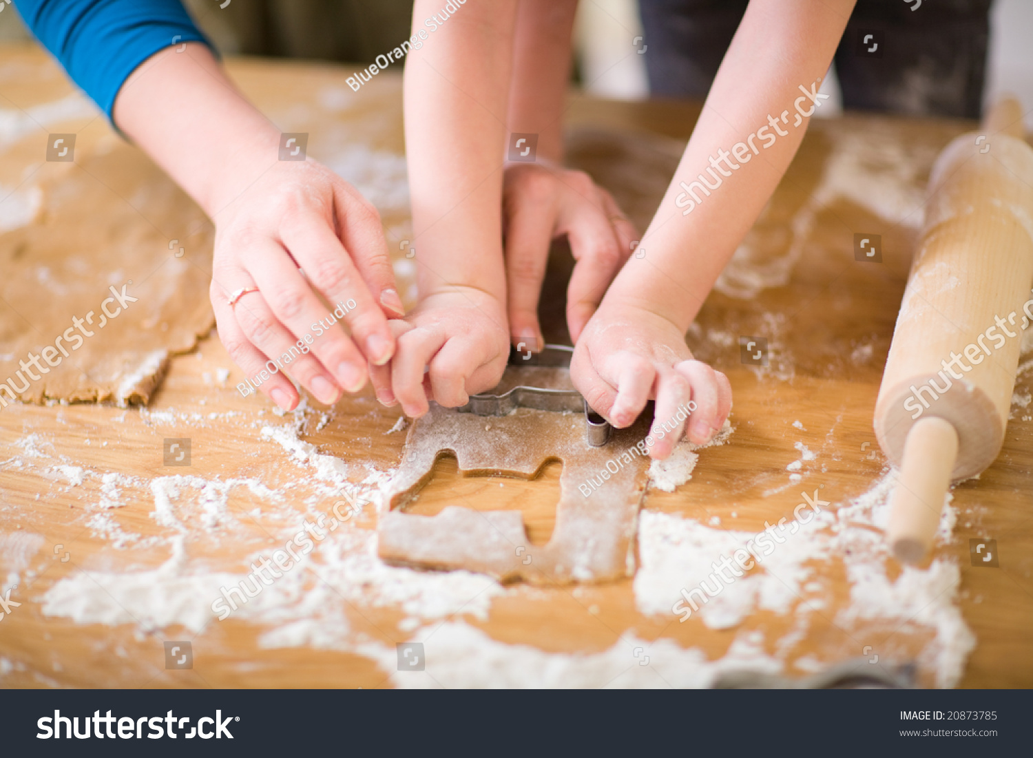 Young mother and son in kitchen making cookies. #20873785