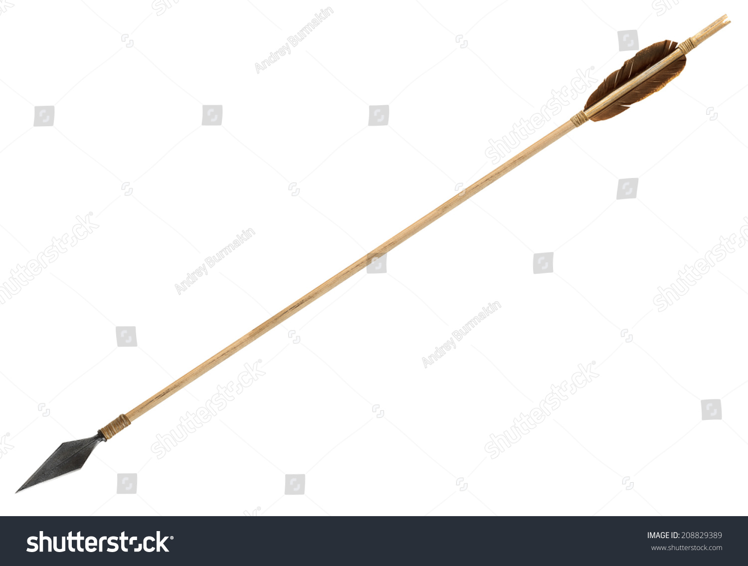 Antique old wooden arrow isolated on a white background #208829389