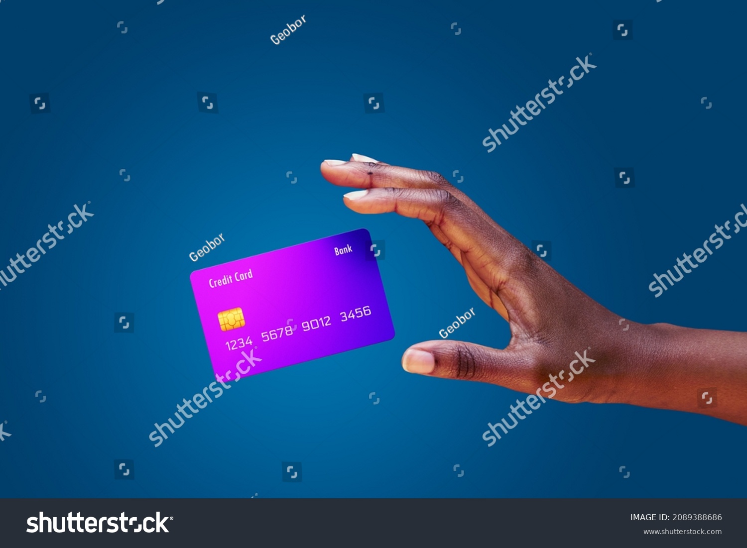 Close up african american female hand and levitating mockup bank credit card with online service on blue background #2089388686