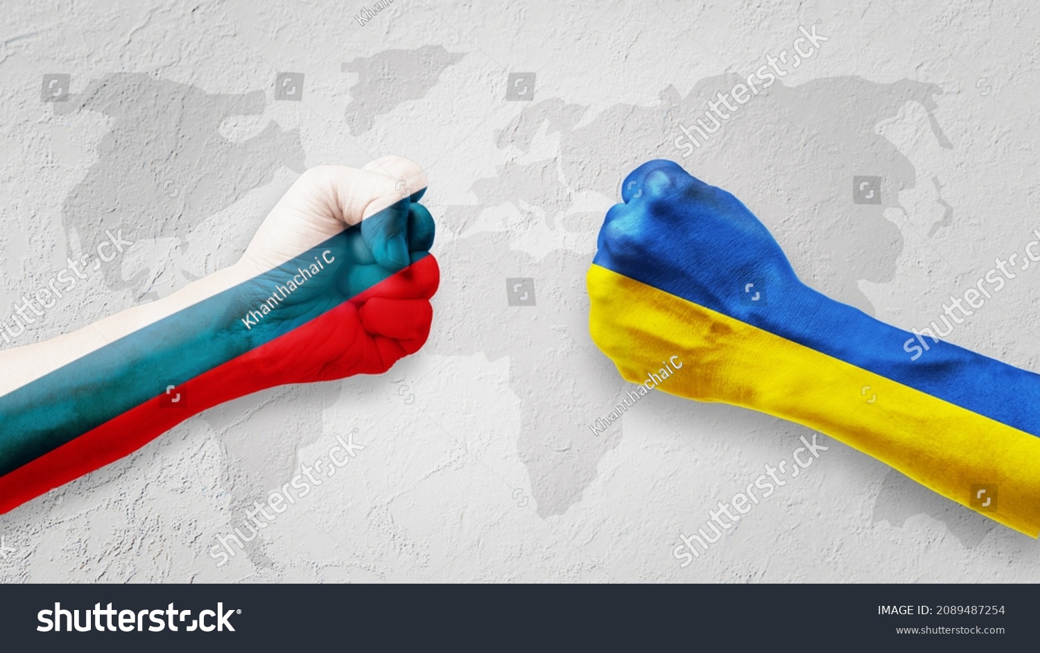 Flags of Ukraine and Russia Flag on hands punch to each others on light gray world map background, Ukraine vs Russia in world war crisis concept #2089487254
