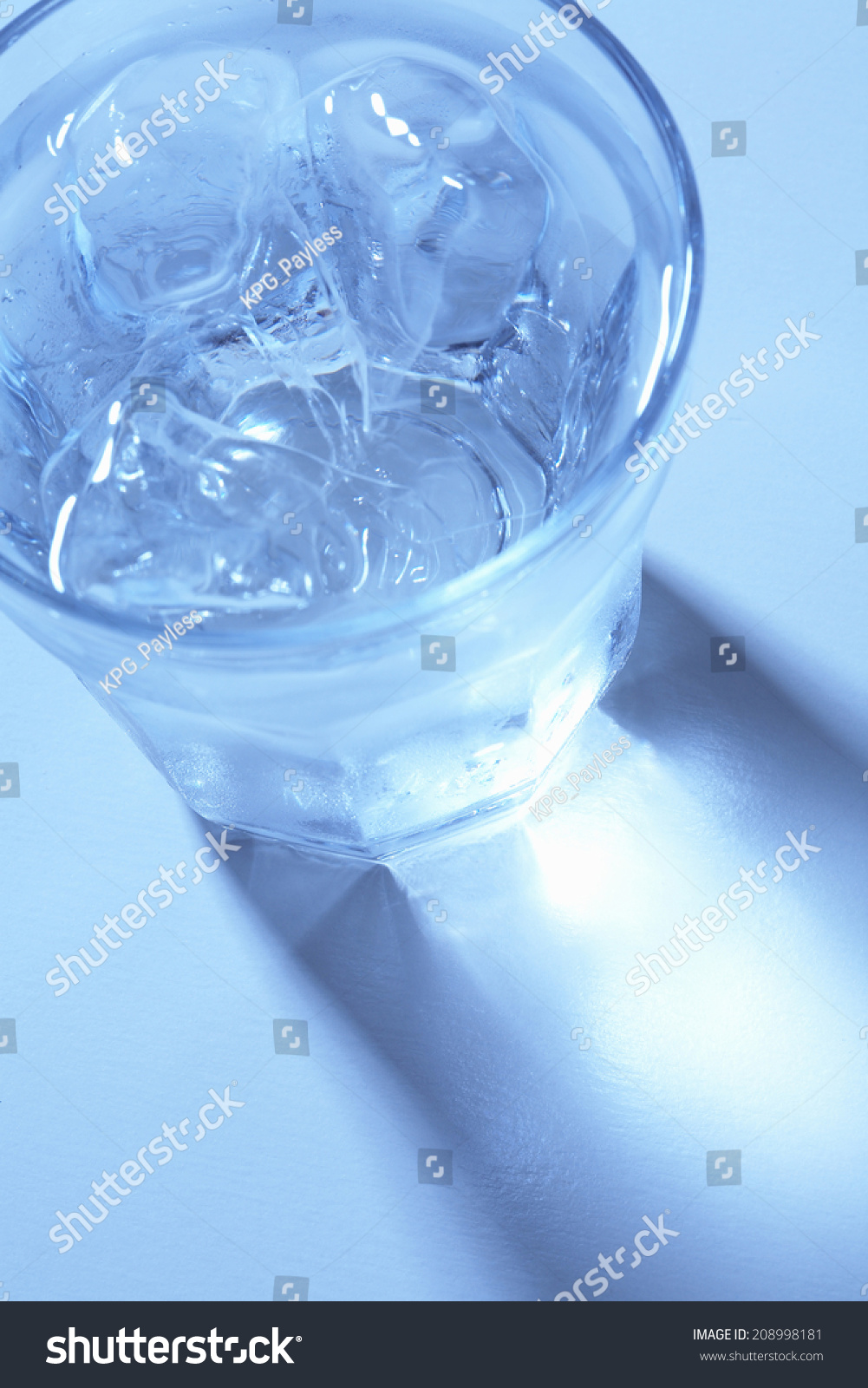 Water Poured Into A Glass #208998181