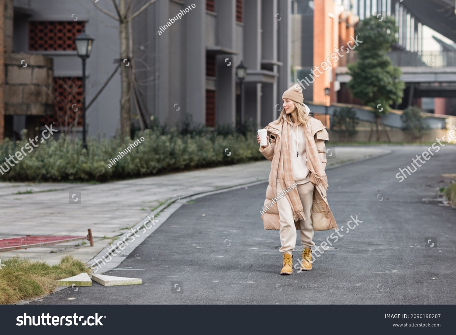 Woman drinking coffee outdoor. Color of the year 2021: ultimate gray. Trendy colors concept, mockup with copy space #2090198287