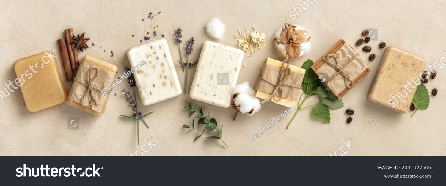 Beautiful Natural soap bars and ingredients on beige background, top view. Handmade organic soap concept, banner #2091027505