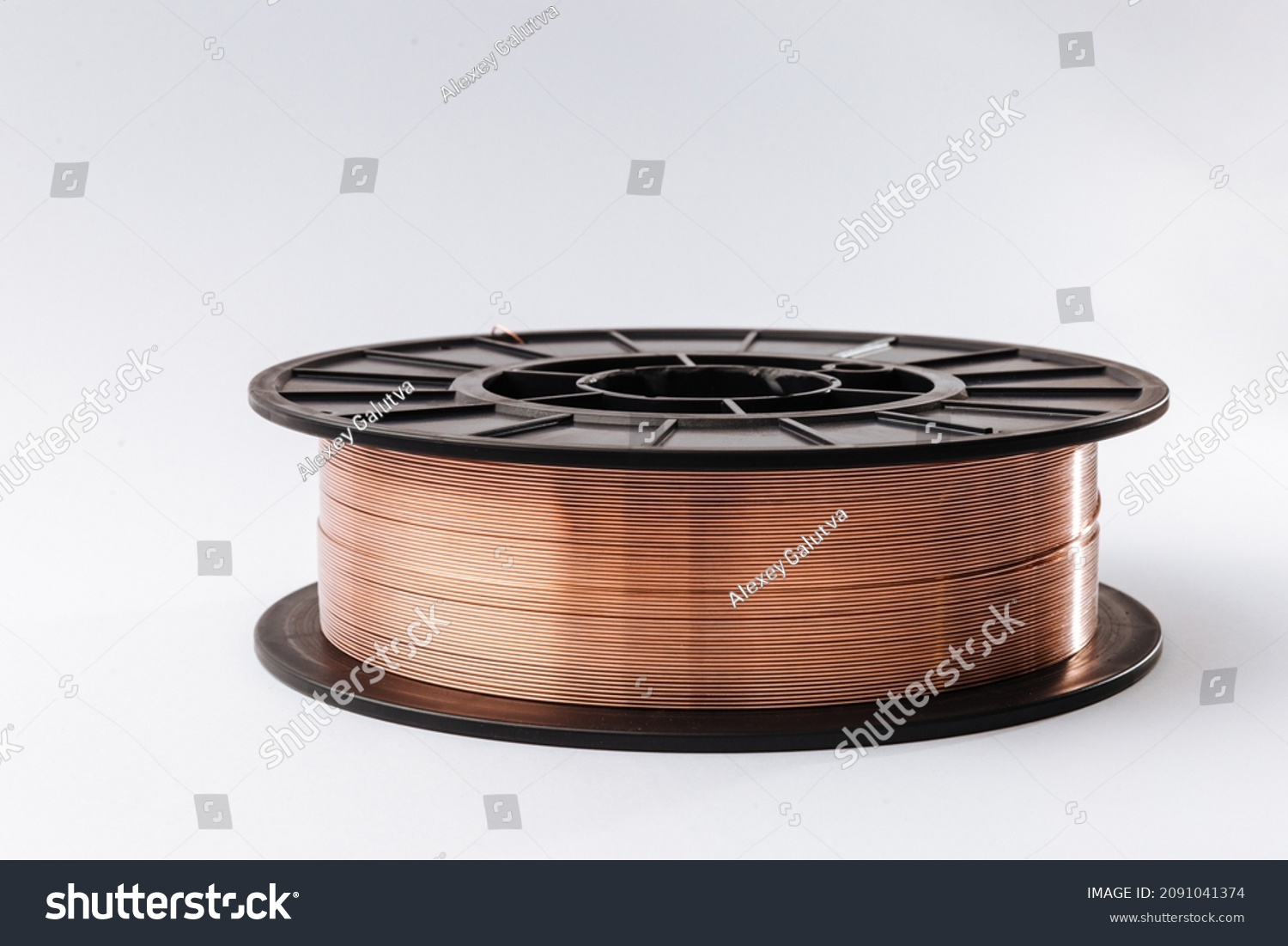 Welding wire spool on a white background. #2091041374