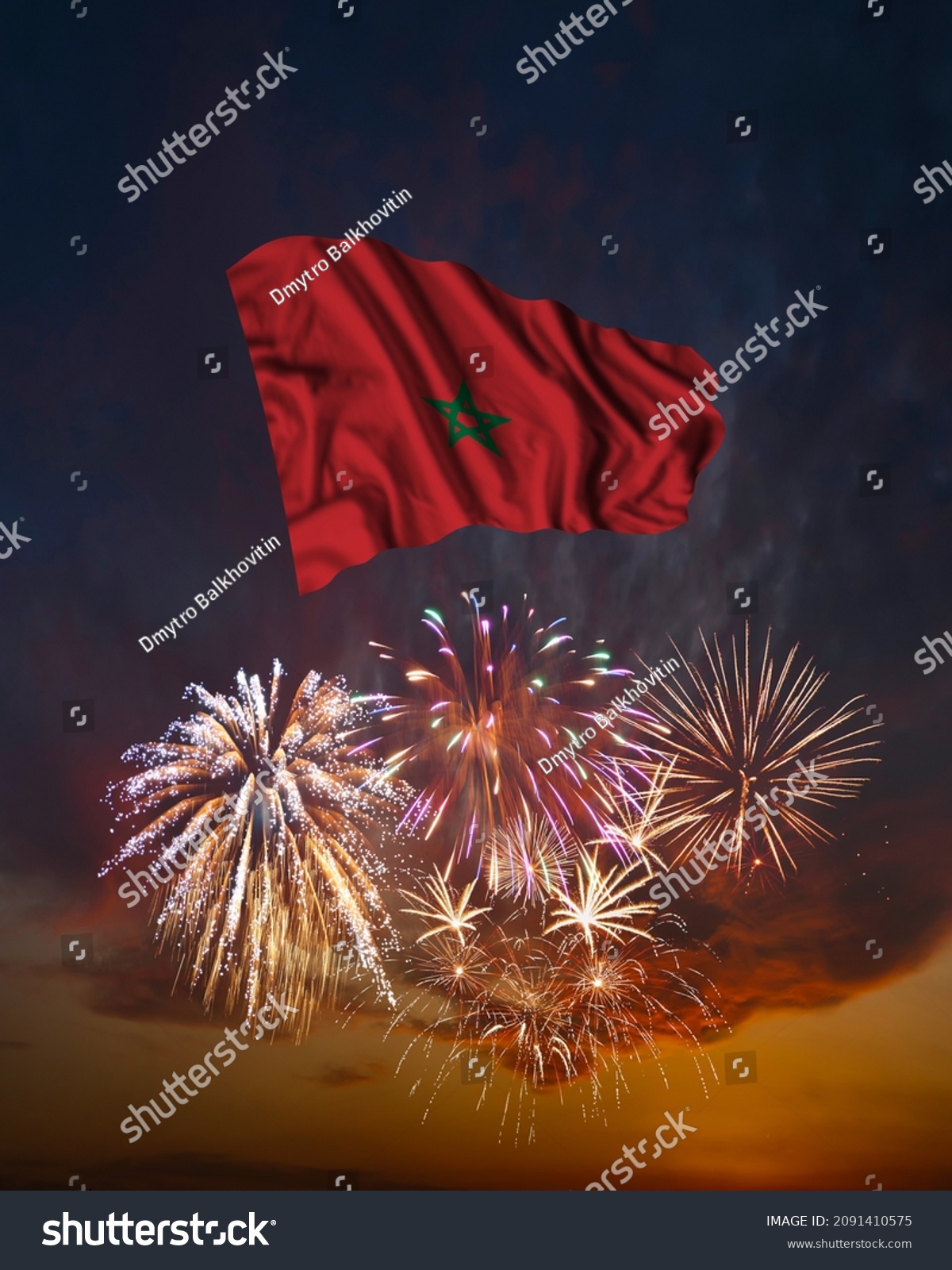 Holiday fireworks in evening sky and flag of Morocco for National Independence day #2091410575