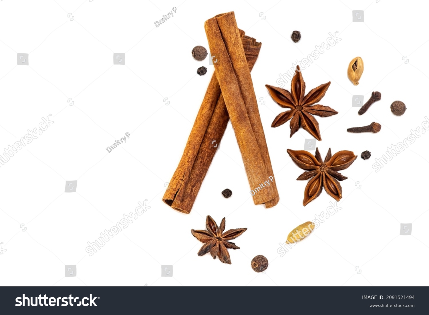 spice isolate. a set of spices for mulled wine. anise, cinnamon and cloves on a white table. spices for making a winter drink on a white background #2091521494
