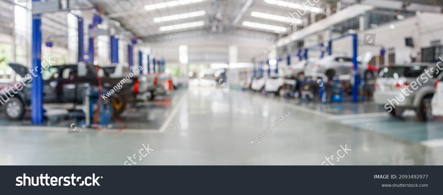 car service centre auto repair workshop blurred panoramic background #2093492977