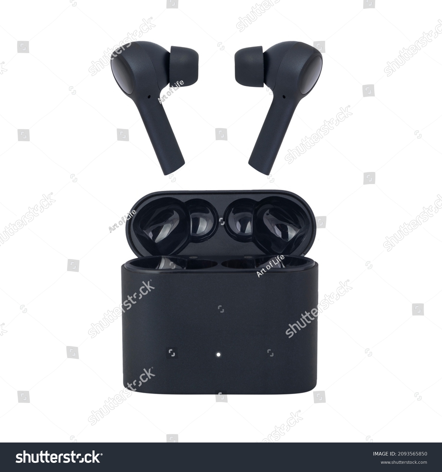 Wireless headphones on a white background. Headset close up in the charging case. #2093565850