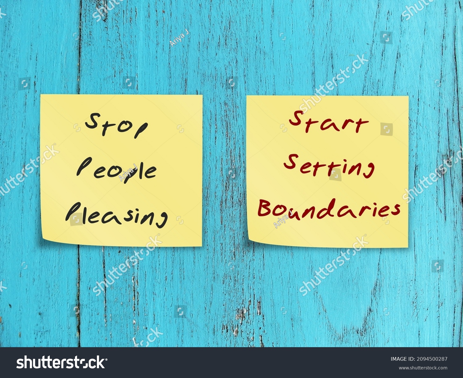 Two notes stick on blue wood background STOP PEOPLE PLEASING - START SETTING BOUNDARIES, concept of people pleaser start to let go the need to be perfect, approval addiction and start to set boundary #2094500287