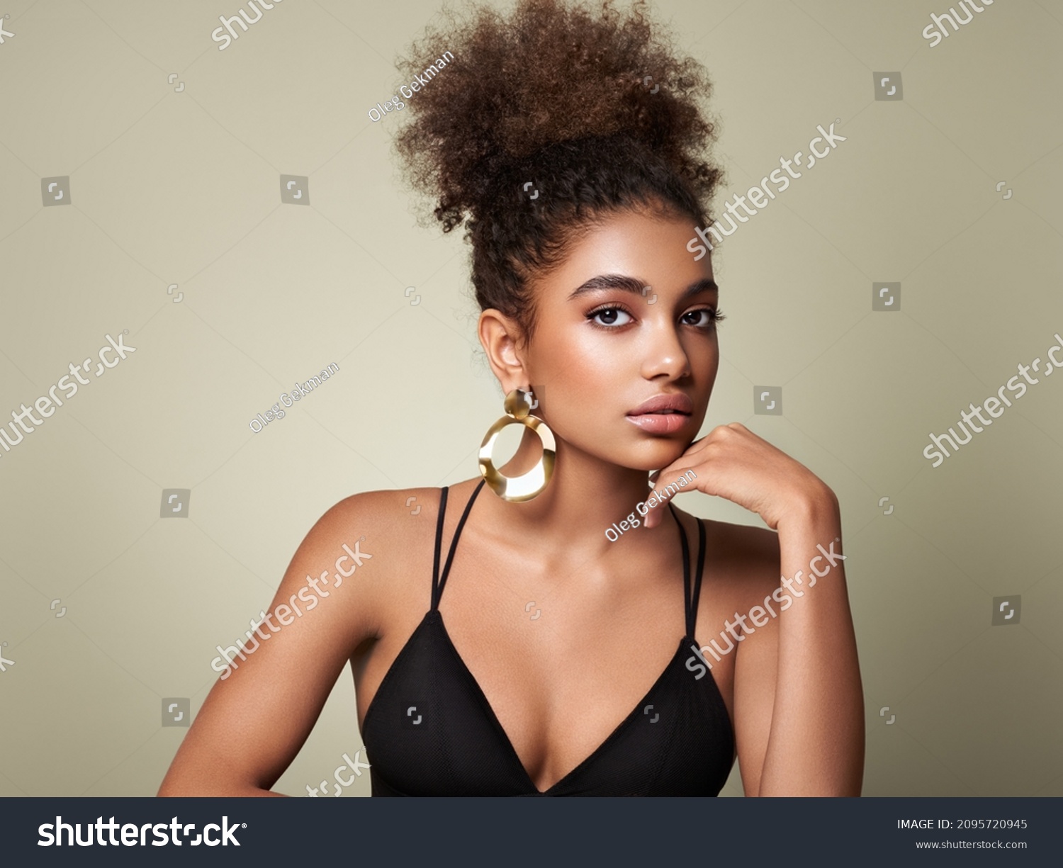 Beauty portrait of African American girl with afro hair. Beautiful black woman. Cosmetics, makeup and fashion #2095720945