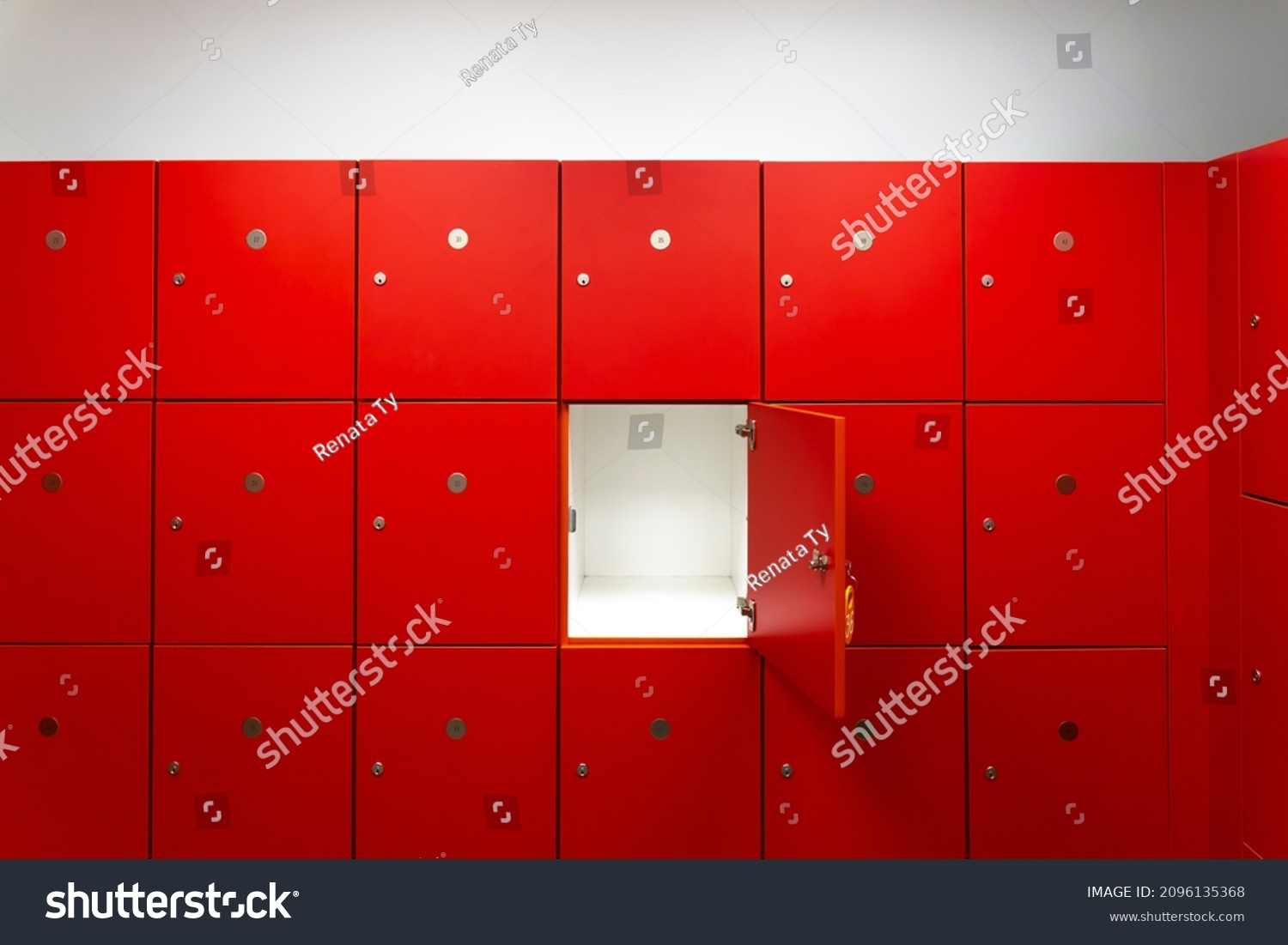 Deposit red locker boxes or gym lockers inside of a room with one central opened door #2096135368