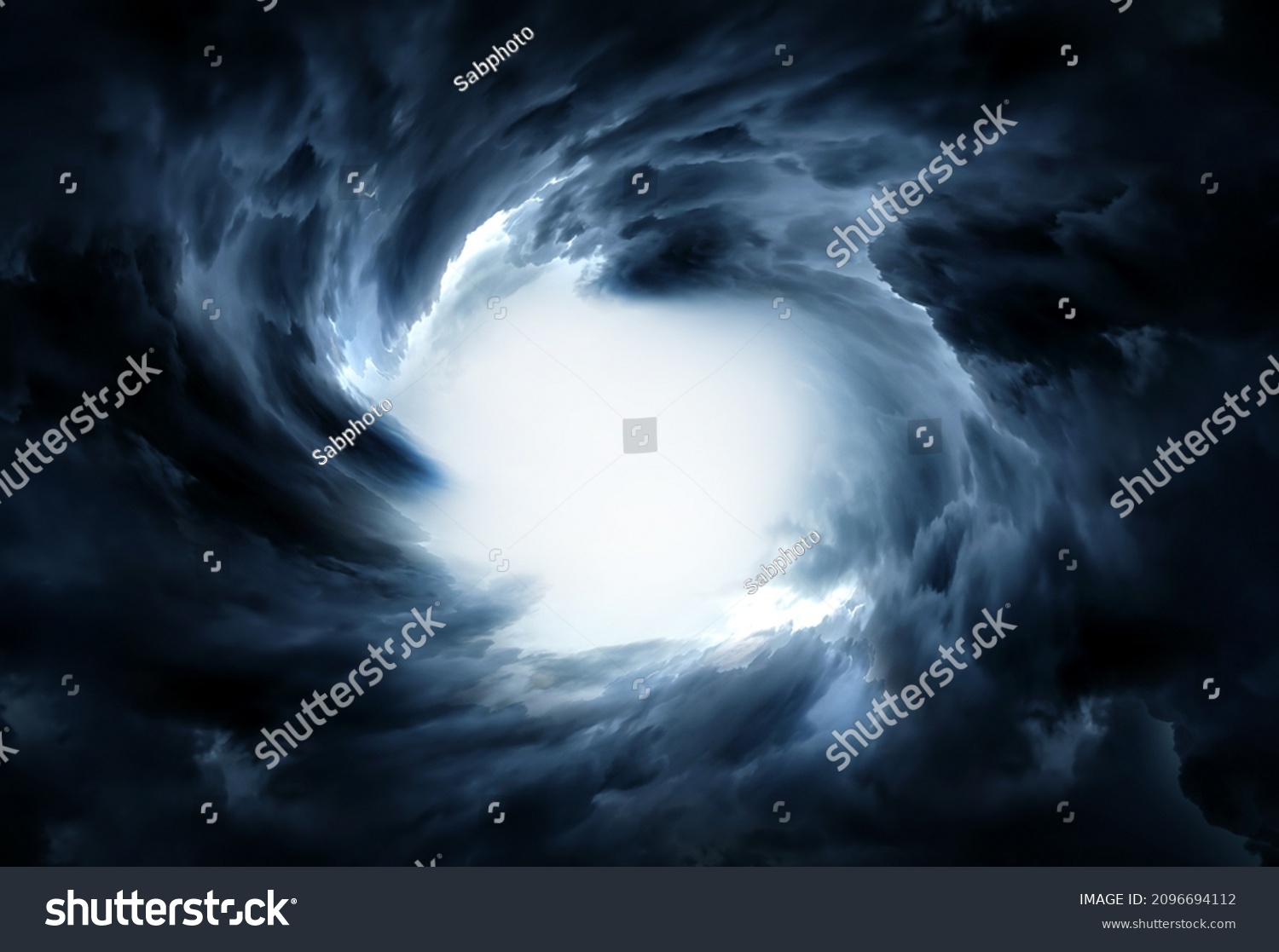 Blurred Whirlwind with a Light in the Dark Storm Clouds #2096694112