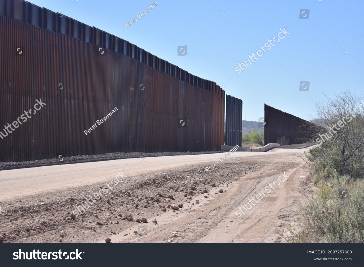 Border wall construction on the USA Mexico border in the Sonoran Desert in Arizona #2097257680