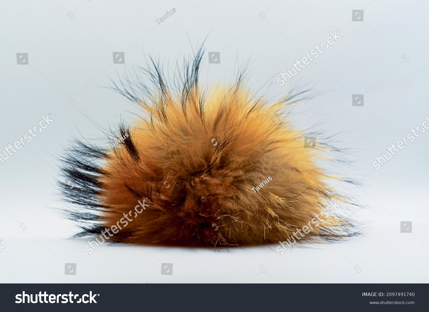 Fluffy lump, fluff in the center of the frame, fur toy, fluffy red fur, place for text, unusual background, piece of fur, fox fur  #2097491740