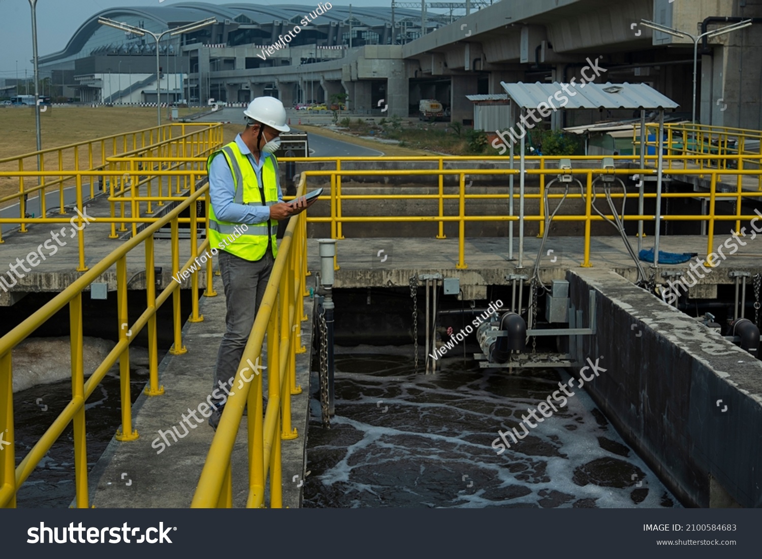 Wastewater treatment concept. Service engineer on  waste water Treatment plant. #2100584683
