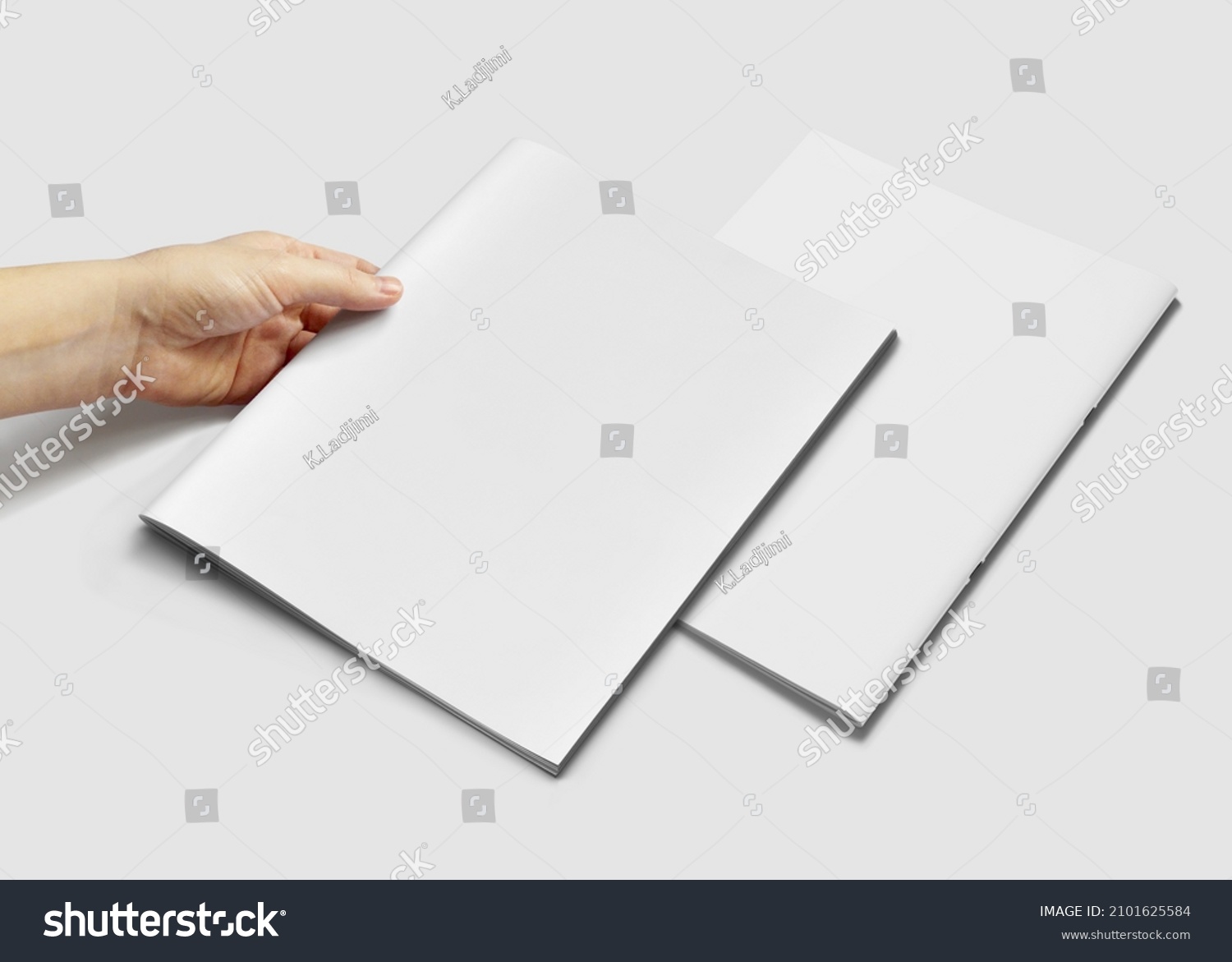 A4 Advertising Magazine Brochure Mockup 3D Rendering with Hand #2101625584
